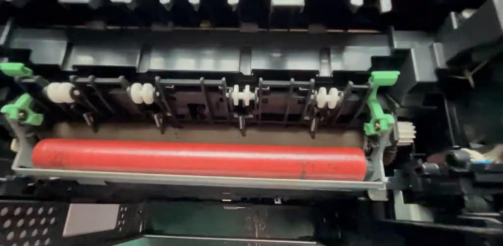 日常维修 联想2655打印机，打印出纸张多处黑点故障维修.